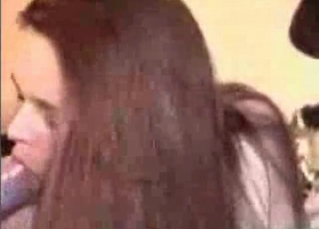 She’s closing her eyes to suck dog cock