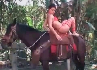 Totally nude chick and a horse