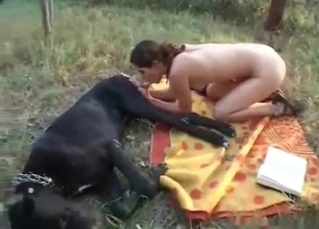 Hot dark-haired babe and a dog