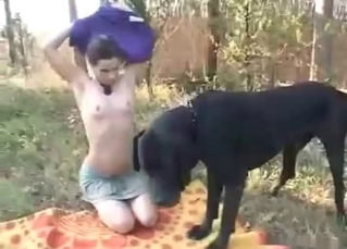 Hot dark-haired babe and a dog