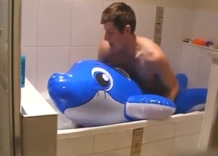Implied bestiality porn with horny dolphin fucker