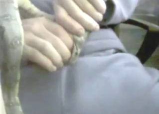 Snake wraps around his dick in zoophile porn